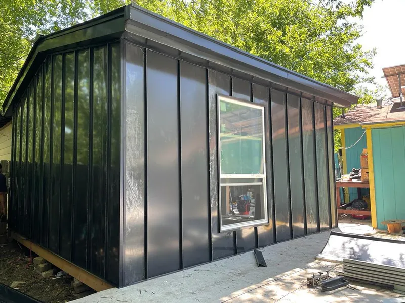 Black standing seam metal wall panels for Roof Inspection in Delhi