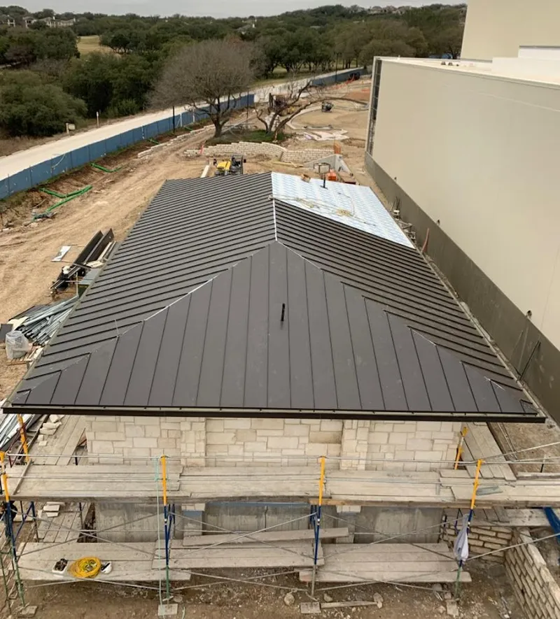 Metal roof new construction with scaffolding in Delhi